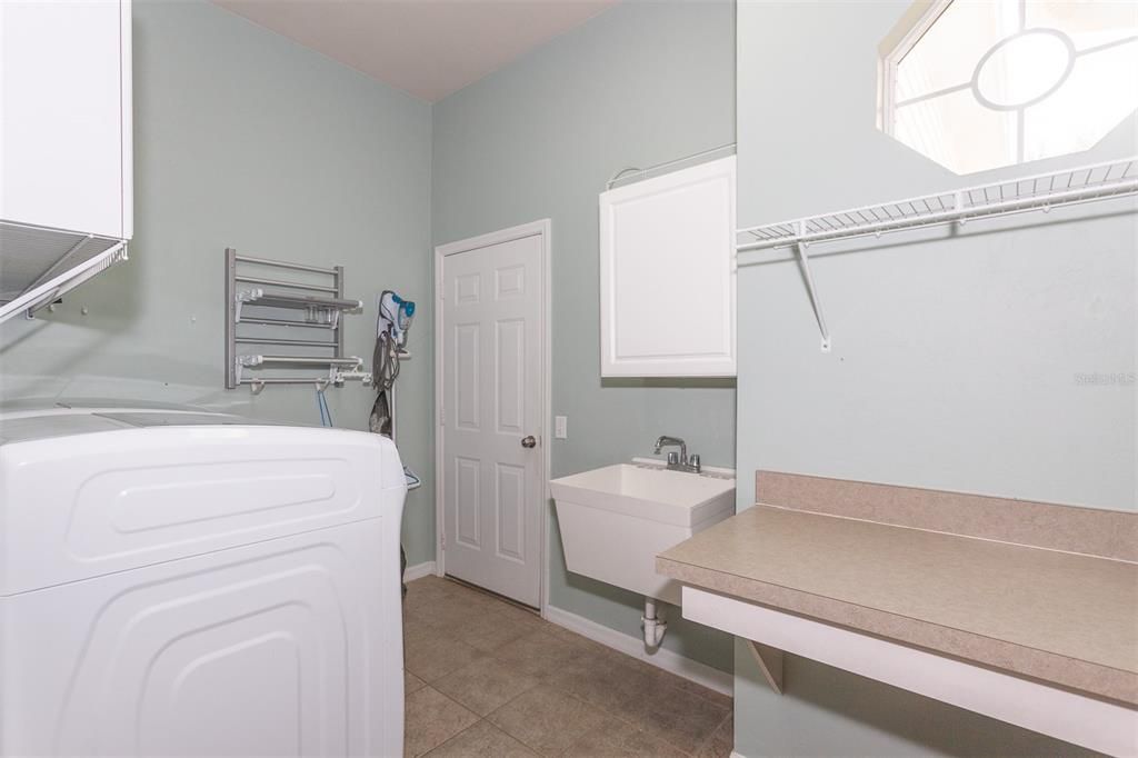 Laundry room with sink and folding space
