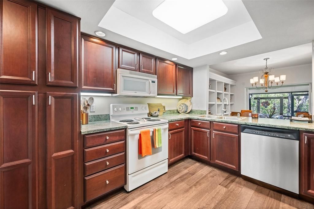 Beautifully renovated Kitchen with abundant storage and separate breakfast nook with built-in desk