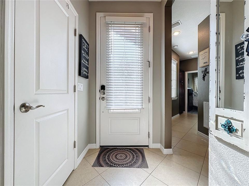 Glass front door, keyless entry, WELCOME HOME
