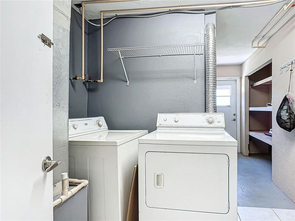 Laundry room with extra storage.