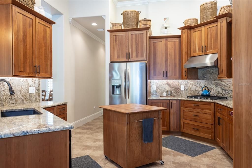 Light Cherrywood Cabinetry w/ mobile Island