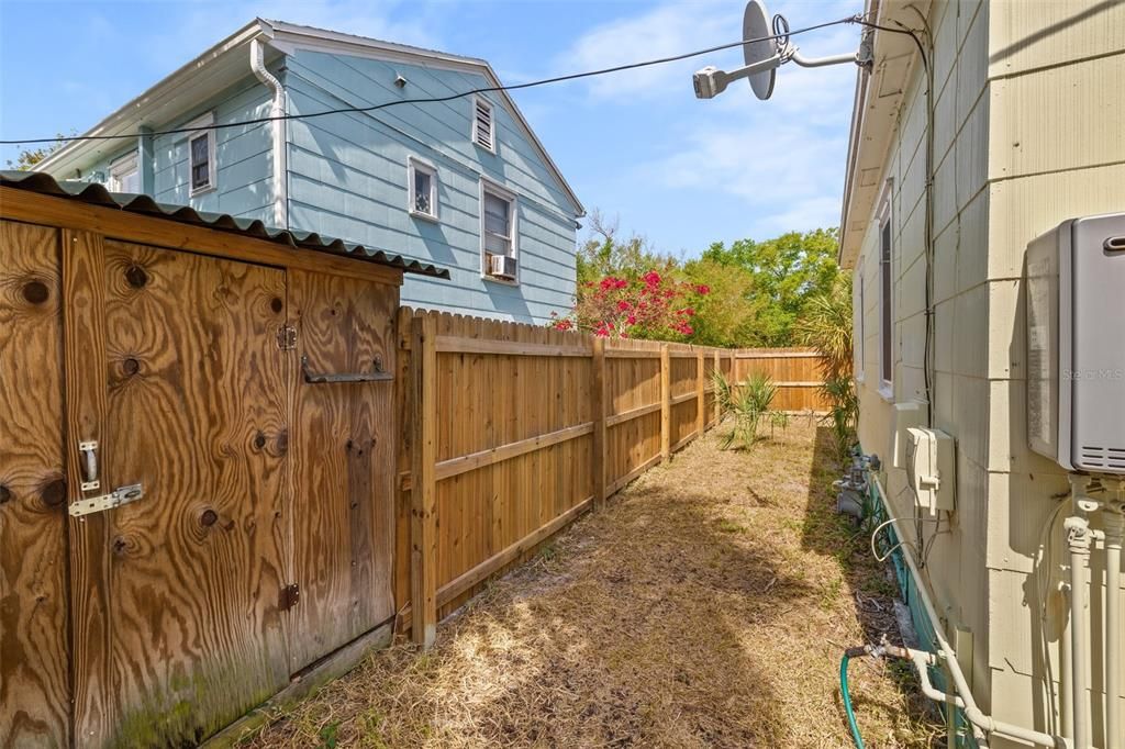 Privacy fence dividing the two properties