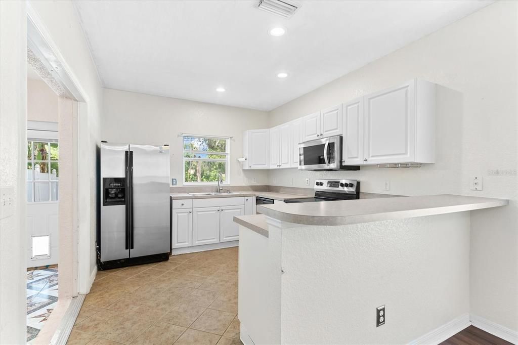 Bright Kitchen with stainless appliances