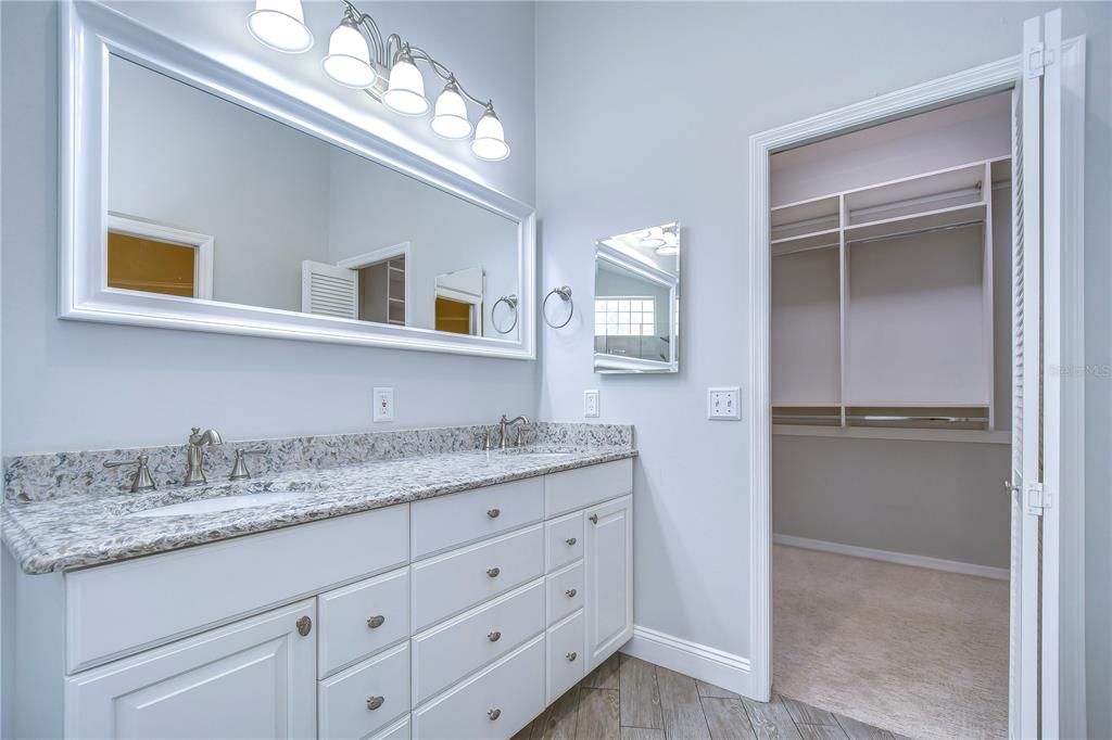 Dual sinks, granite counter tops and separate walk in shower!