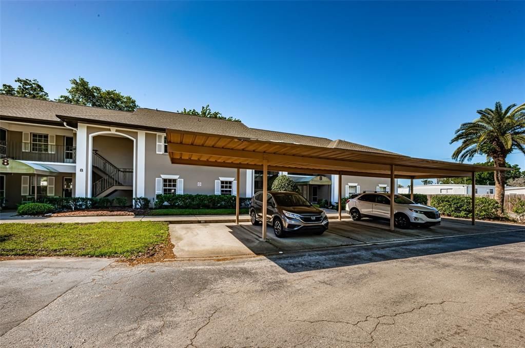 One Covered Carport Space Included