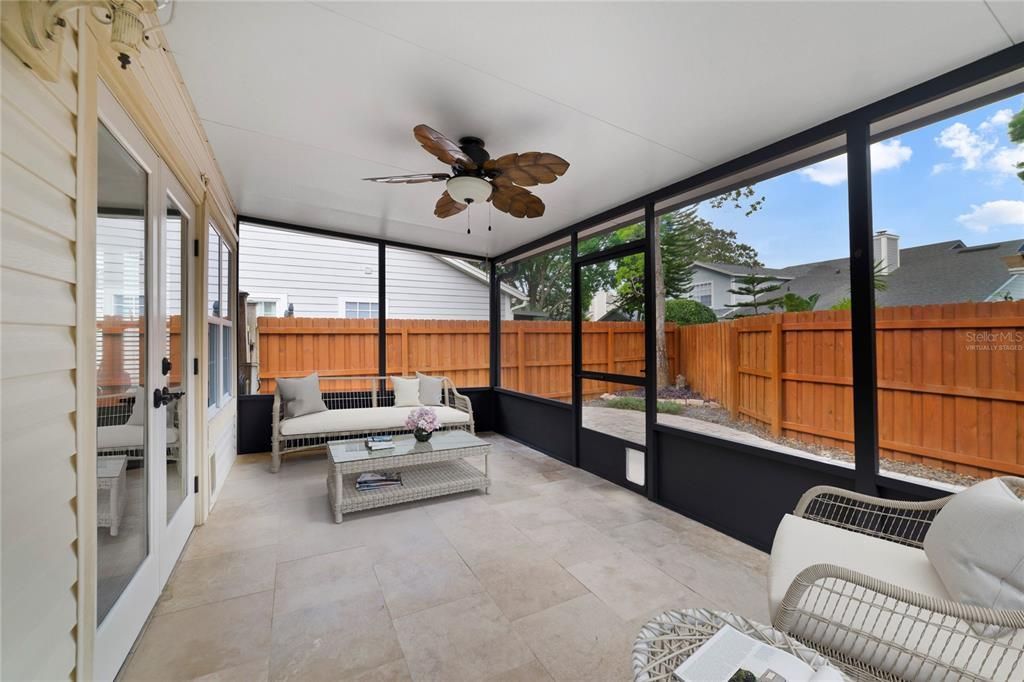 Relax and unwind in the screened lanai! Virtually Staged.