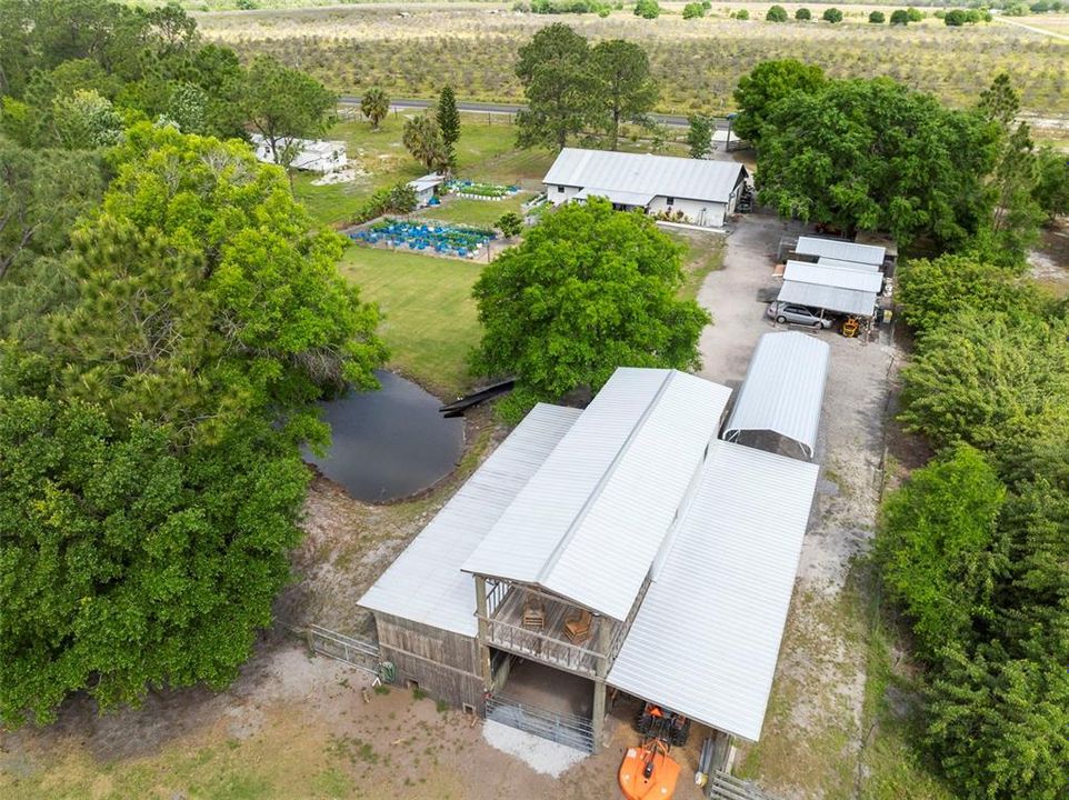 AERIAL OF BARN SHED AND HOME