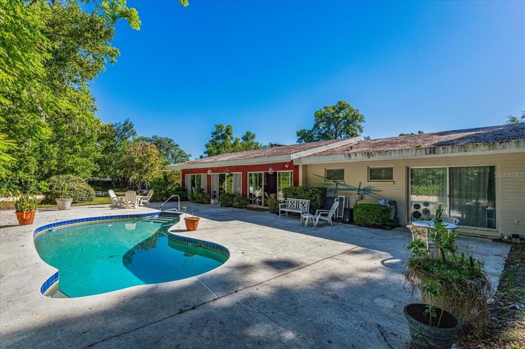 generous patio surrounds the pool for entertaining