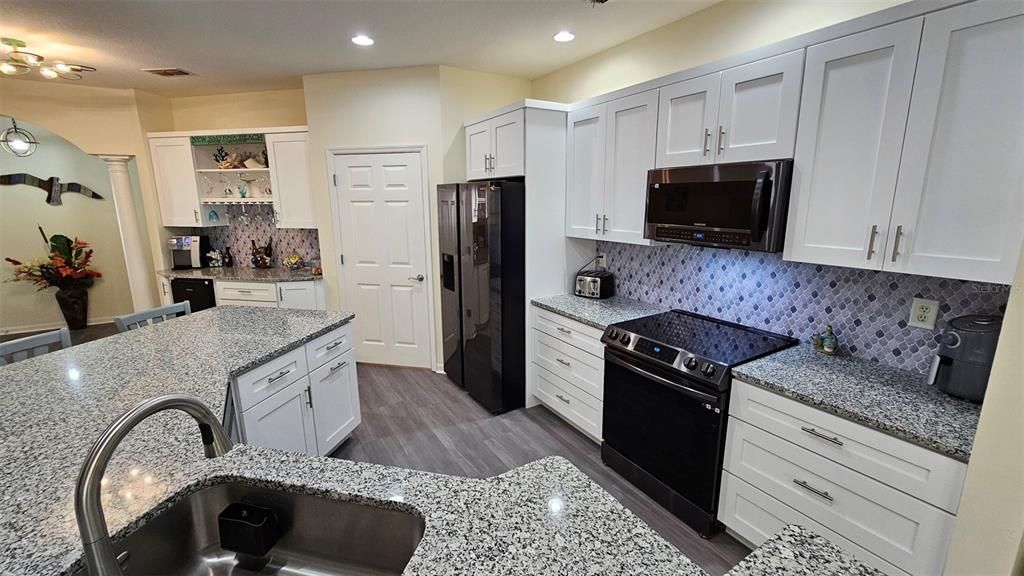 Kitchen with granite countertops