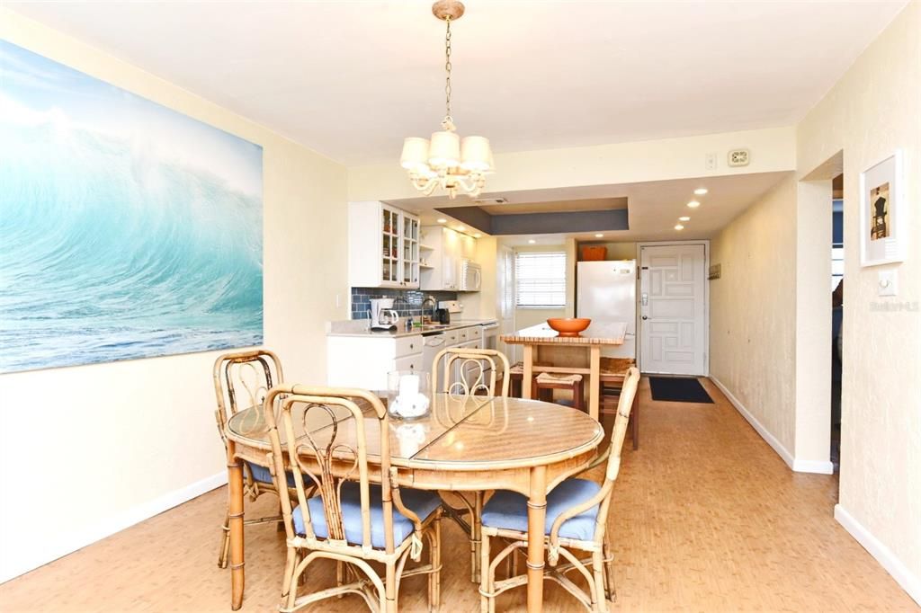 Dining area with Kitchen in background.