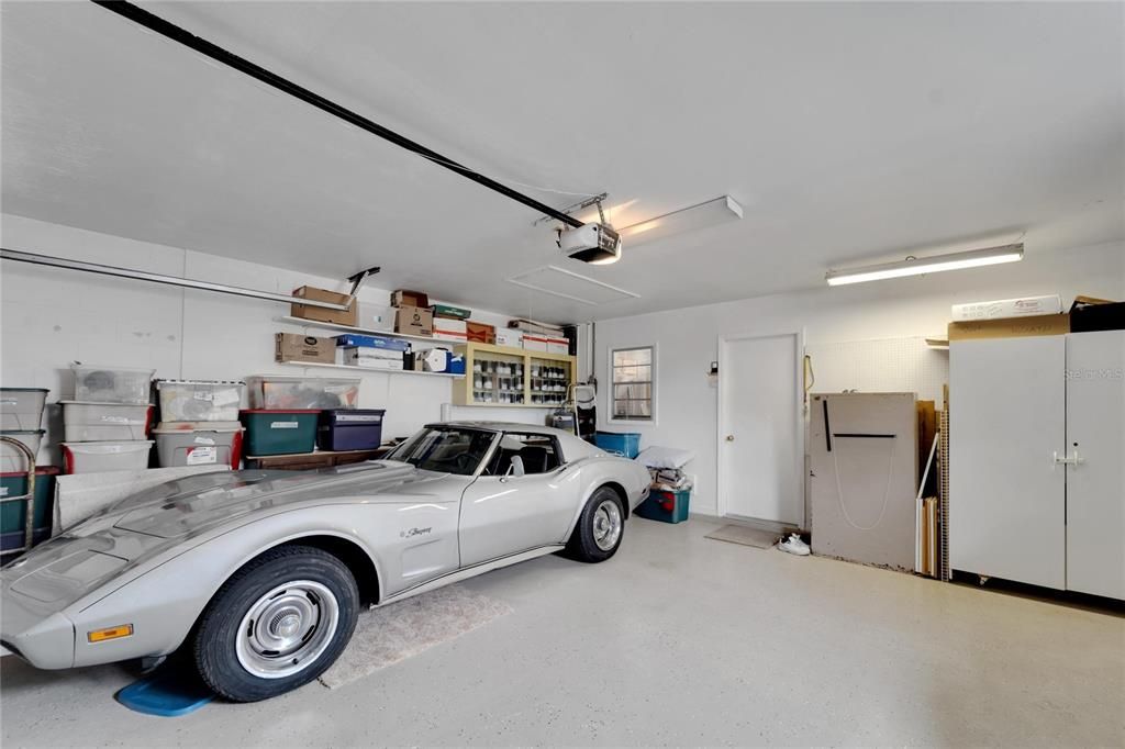 Into the garage with room for a second car and a workbench