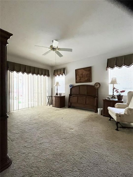 Primary bedroom is large with access to screened lanai.