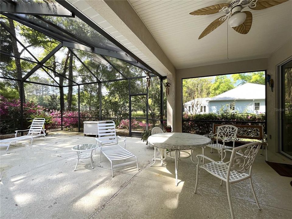 Lots of entertaining or relaxing space outside on your screen enclosed lanai.  Sit back and just take in nature!