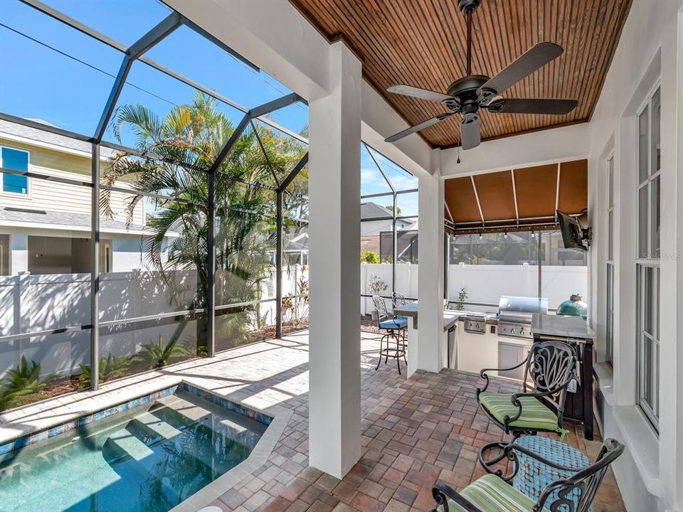Lanai and outdoot kitchen are screened with the pool and offer great entertaining space.