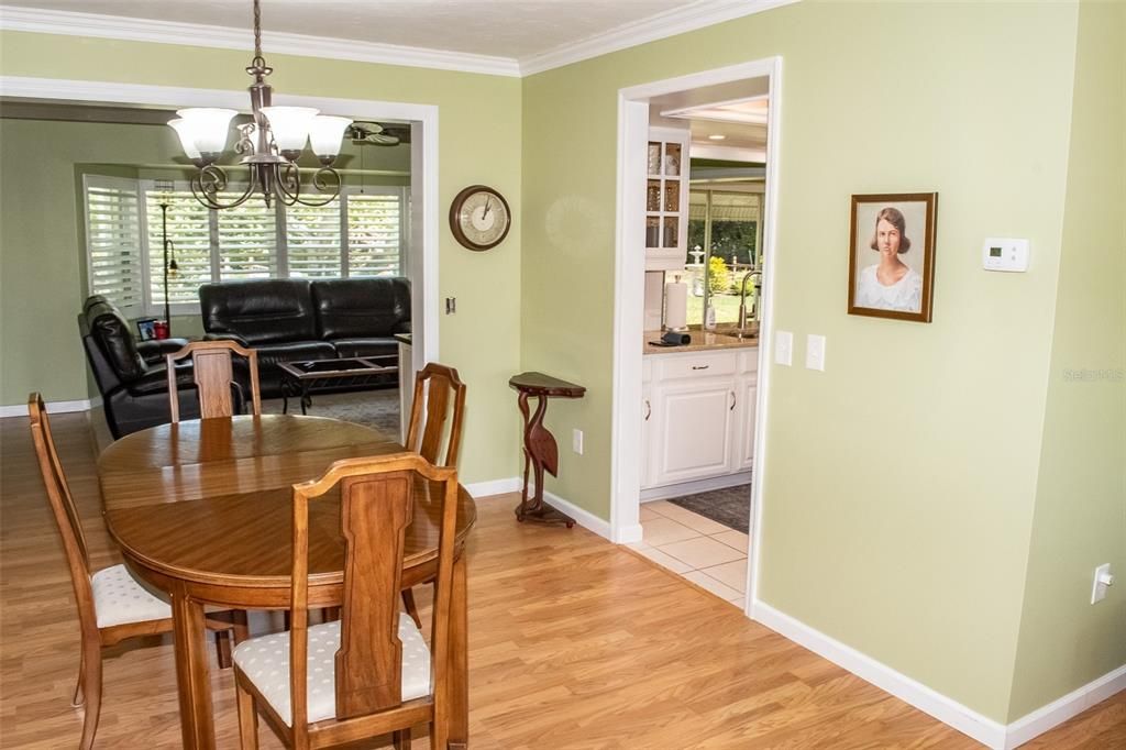 Formal dining room with family room beyond