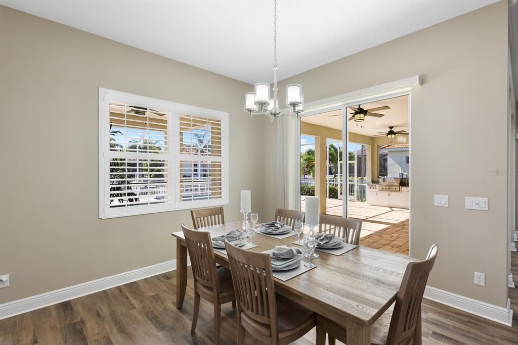 Sliding glass doors and window in dining room