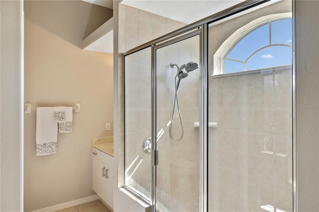 Primary Bathroom-  Glass enclosed walk-in shower....