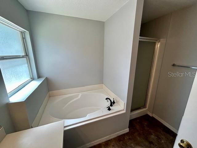 Primary Bath with tub and shower
