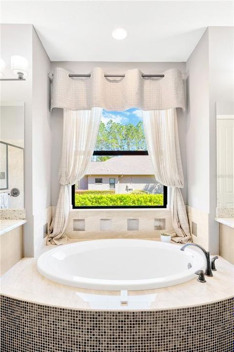 Enjoy a lovely soak in this beautiful tub.