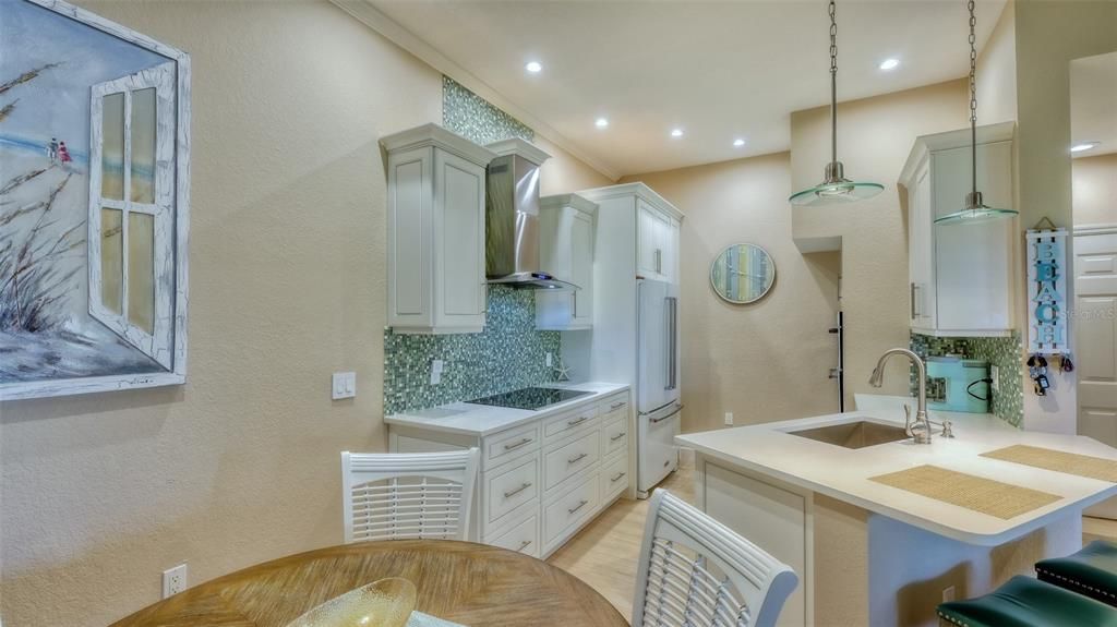 The kitchen has been completely remodeled with Kitchen Aid appliances and custom cabinets.