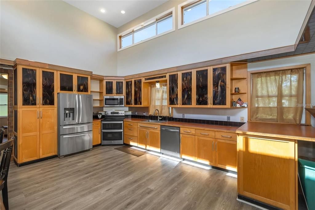 Oversized kitchen with stainless steel appliances