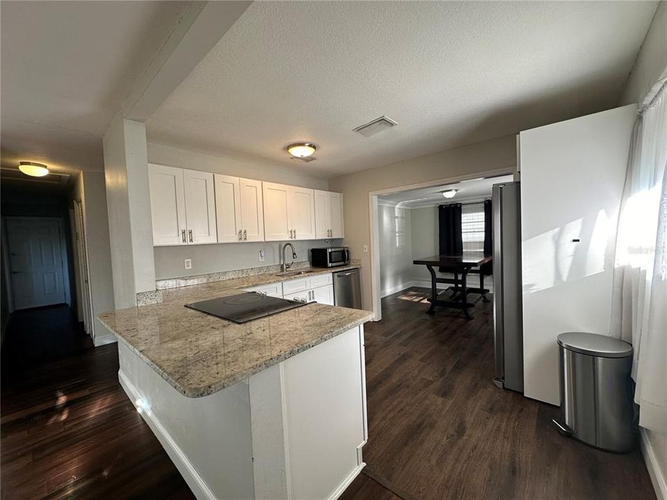 Updated Kitchen with Shaker Cabinets, Stainless Appliances and Granite Countertops