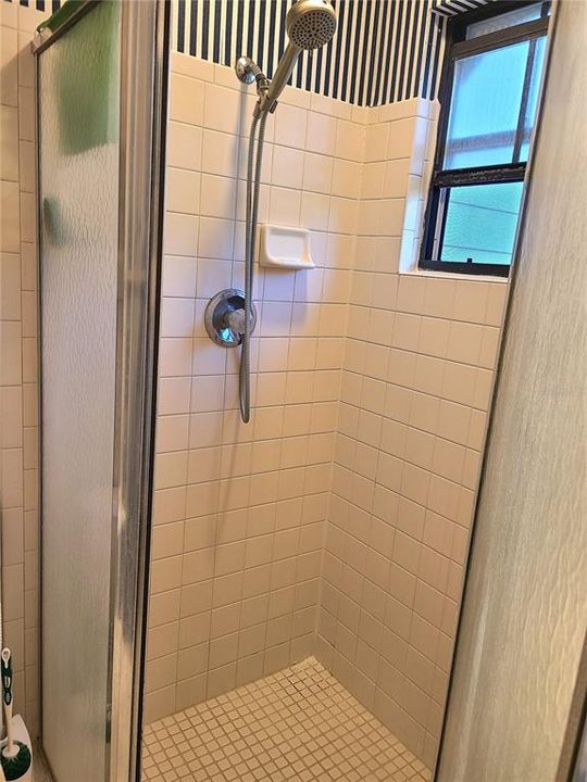 Shower area with tile