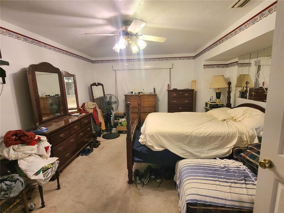 Spare bedroom is large and has walk in closet