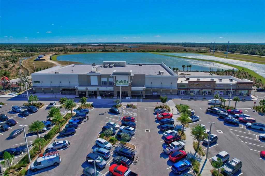 Publix, Clover Nails & Spa, STELLAR Vision, Pack and Ship, and Animal Hospital located in Babcock Ranch