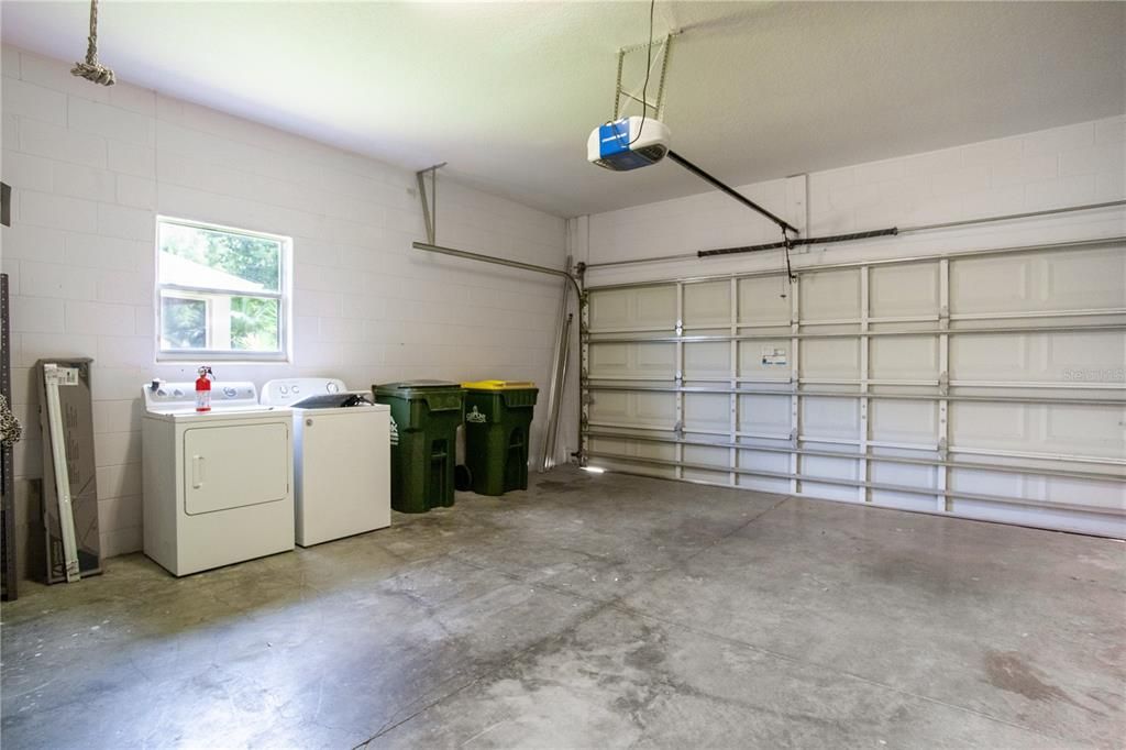 Garage with dropdown ladder in ceiling
