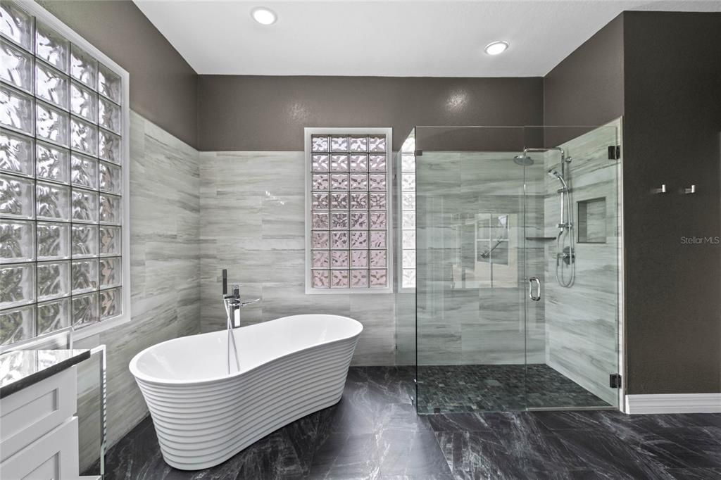 The master bath was recently updated to include a soaking tub and walk in shower.