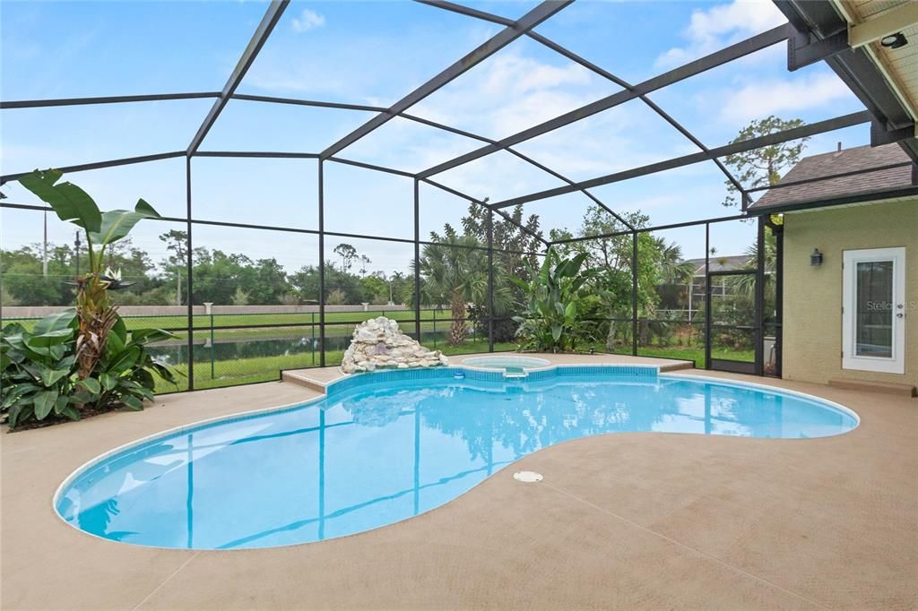 The pool if fully screened and offers plenty of room for deck furniture.