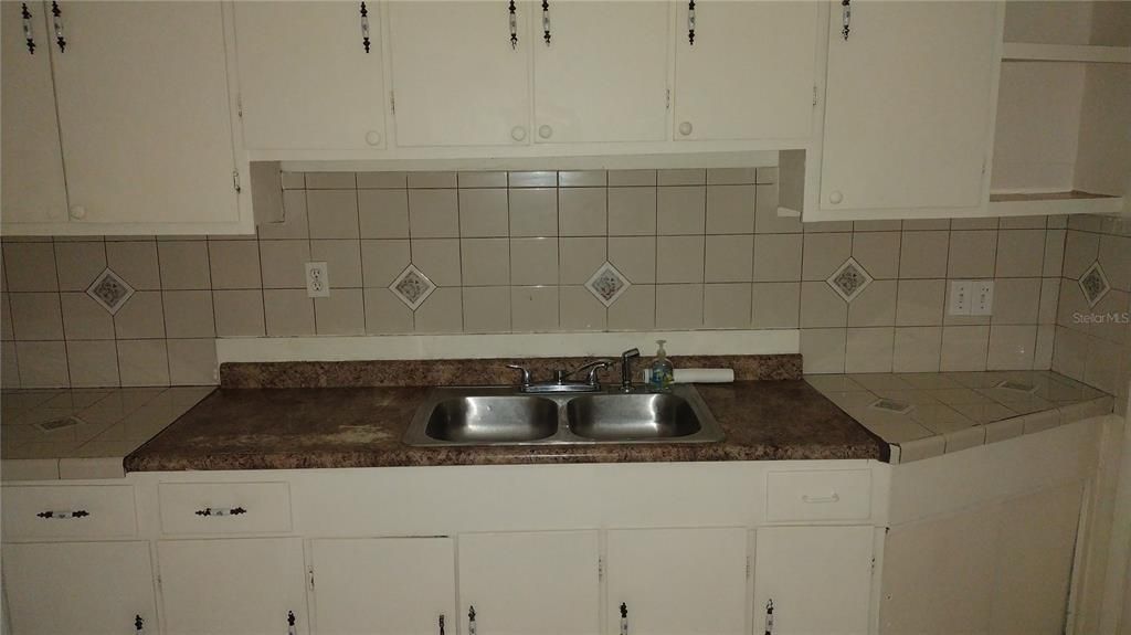 Custom tile and countertop in kitchen