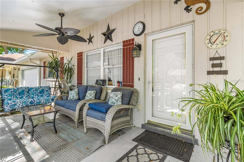Large Front porch with ceiling fan