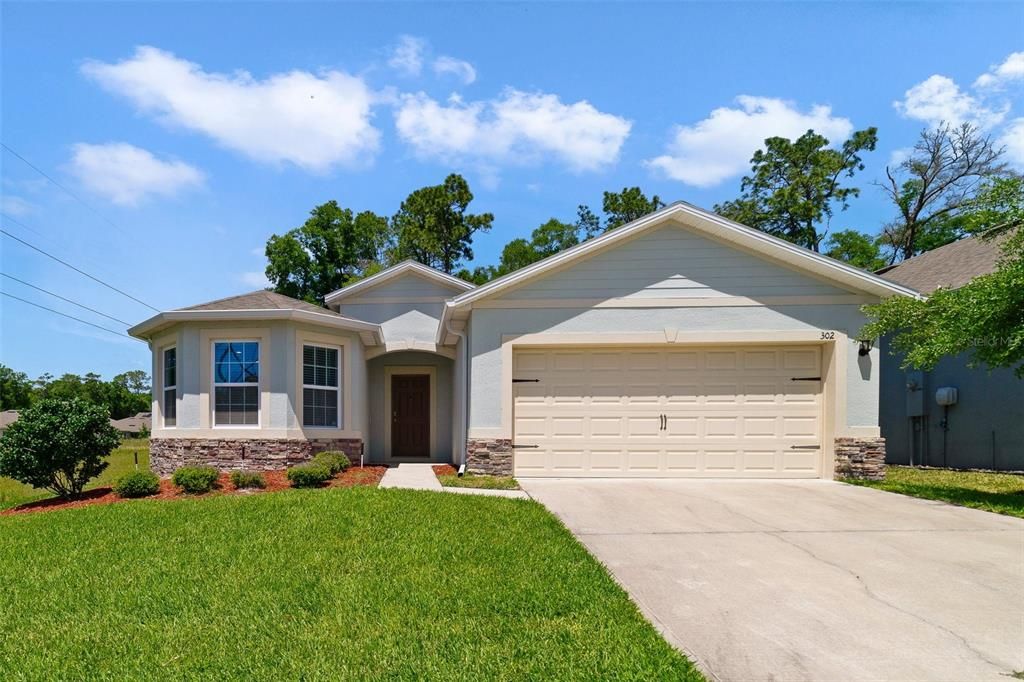 No need to wait for a new build, this 3-bedroom, 2-bath block home was completed in 2020 and **FEELS LIKE NEW** with a bright open concept, SMART HOME TECHNOLOGY, TILE FLOORS THROUGHOUT, fresh paint and you are just around the corner from the Victoria Oaks AMENITIES!