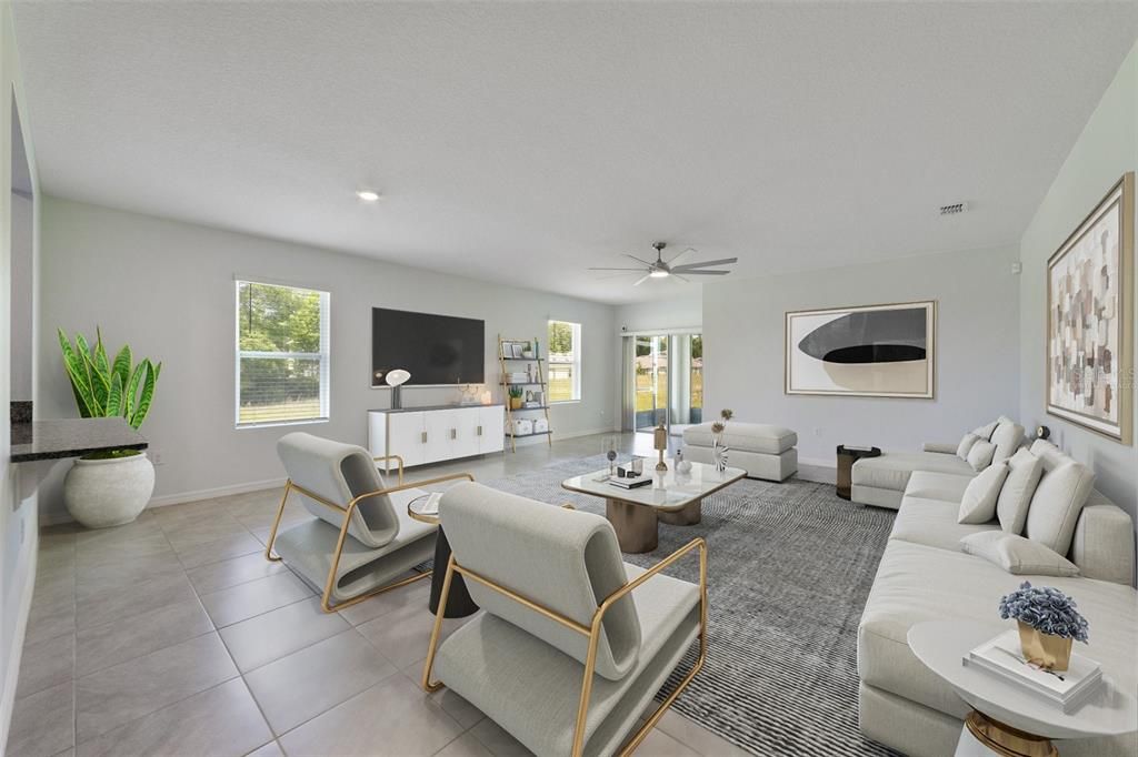 The expansive living area gives you the ideal gathering space for family and friends with sliding glass door access to the lanai and a view of the trees beyond. Virtually Staged.