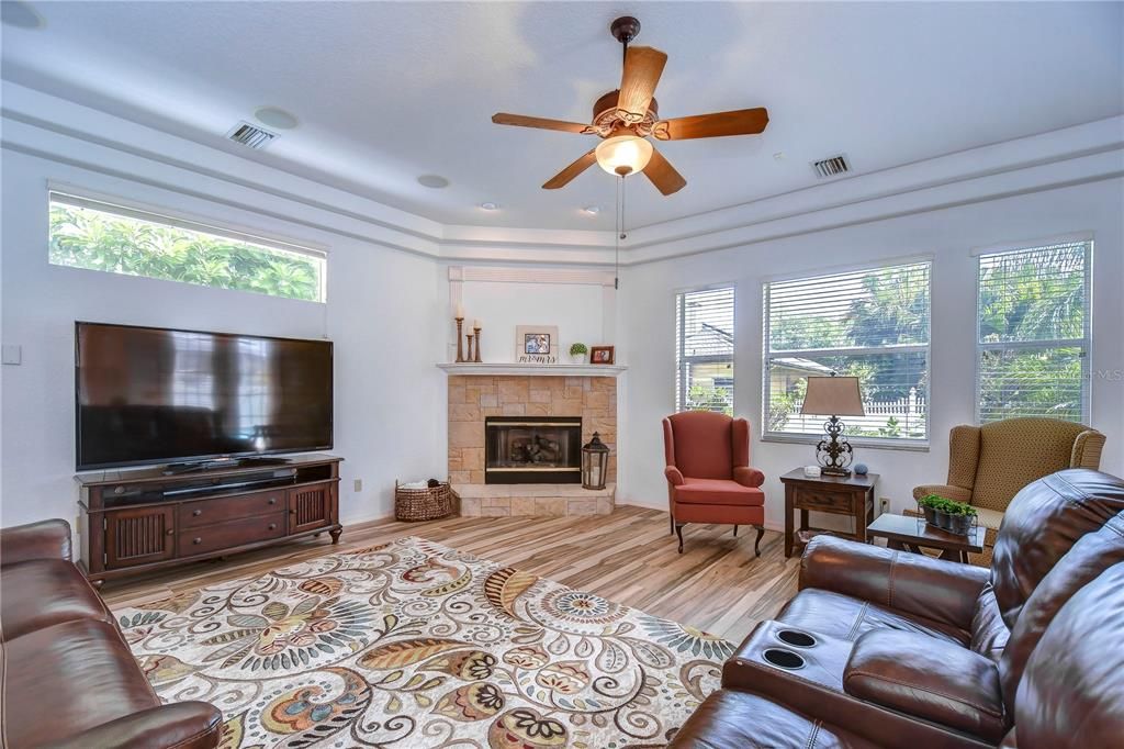Spacious family room features a beautiful gas fireplace!