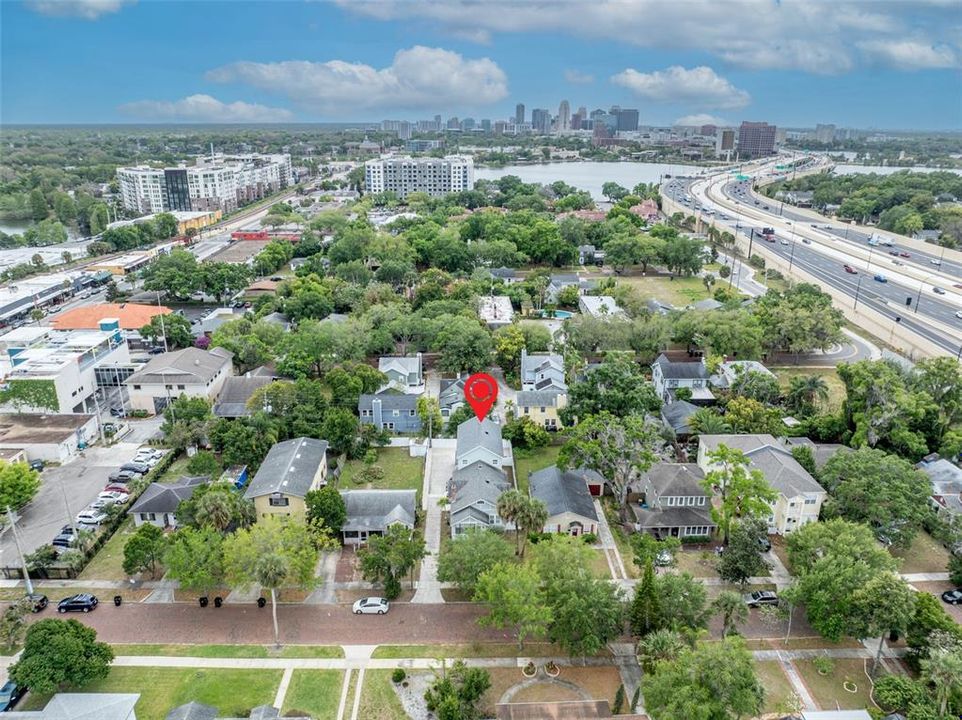 Aerial view from the north showing I-4, west toward Tampa, Orlando's downtown skyline, Lake Ivanhoe and Ivanhoe Village.