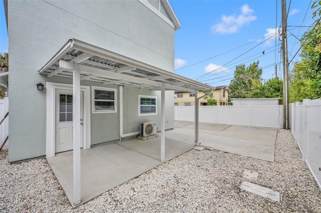 Exterior covered patio with access to Garage studio apartment.