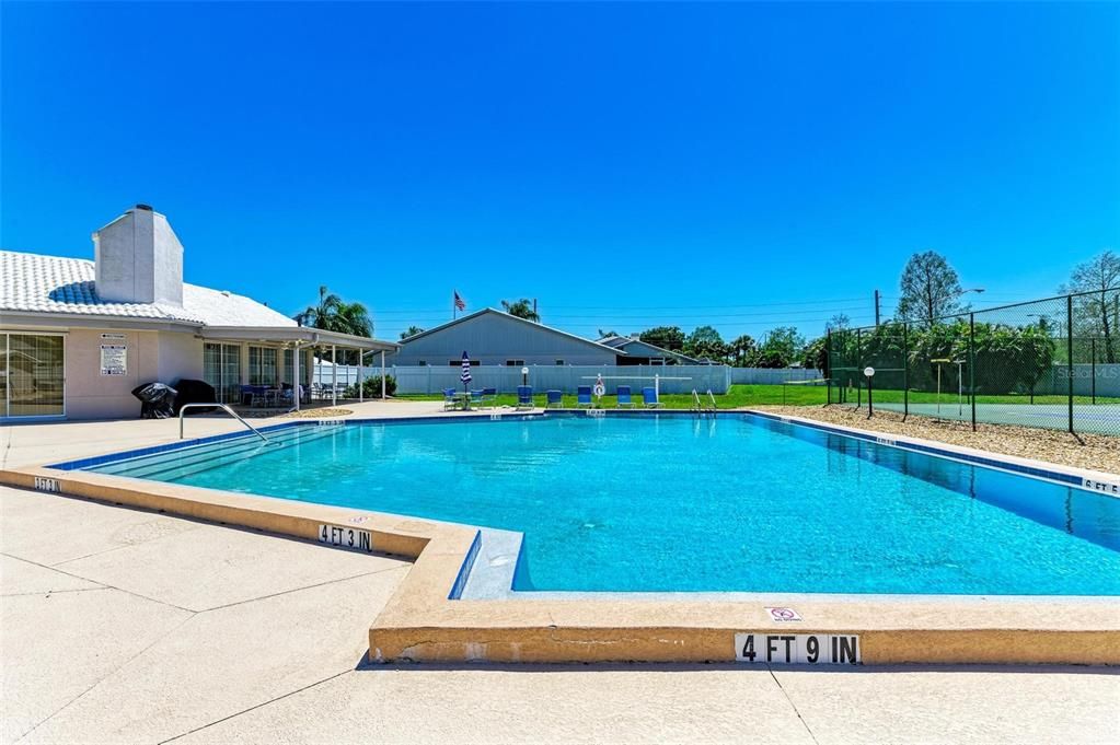 Spacious heated pool, expansive deck area and covered lanai area.