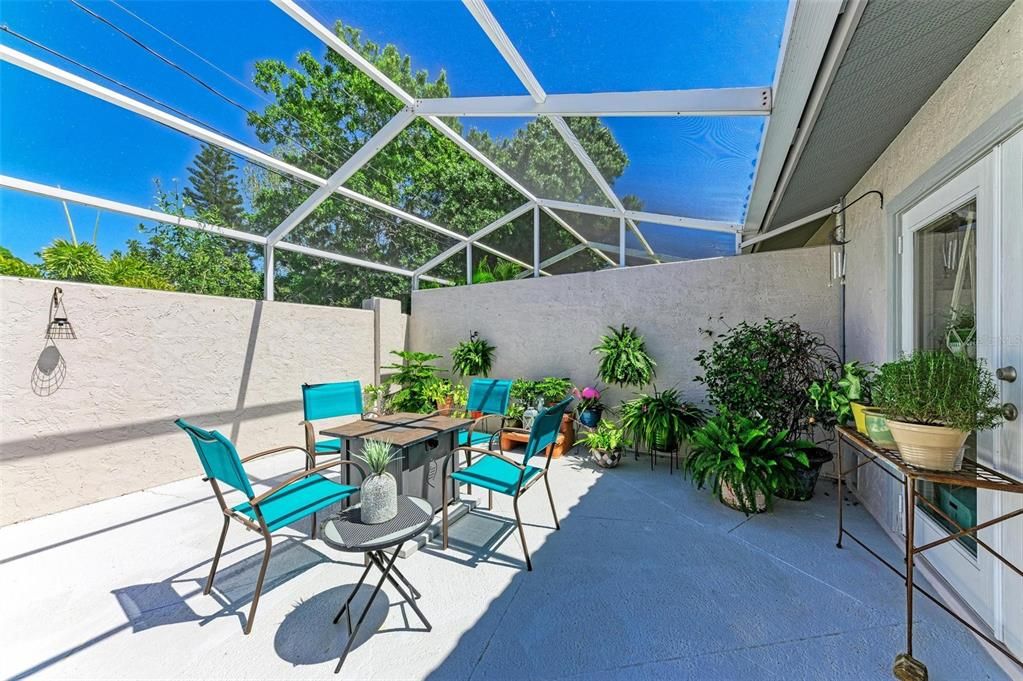 Screened Courtyard is 18'x36' and offers private outdoor living area. Fire Pit is included.