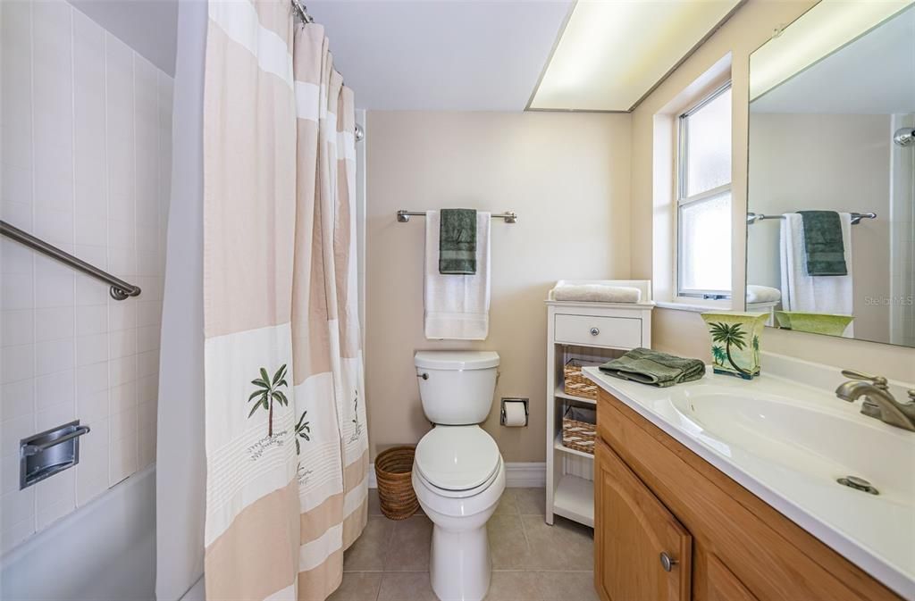... Master Bath - Tub With Shower,. Updated  Wall Finish - New Toilet - Updated Flooring.