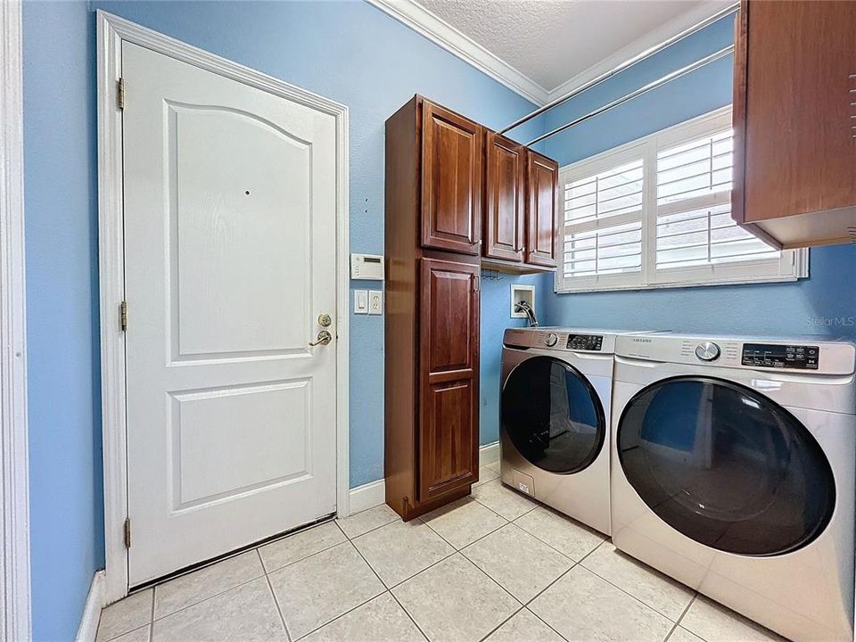 Laundry room - washer & dryer remain off of kitchen