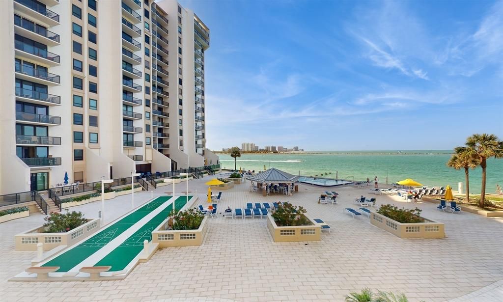 Balcony has a view across the Pool Deck and Pool, to Clearwater Pass and Sand Key in the distance.