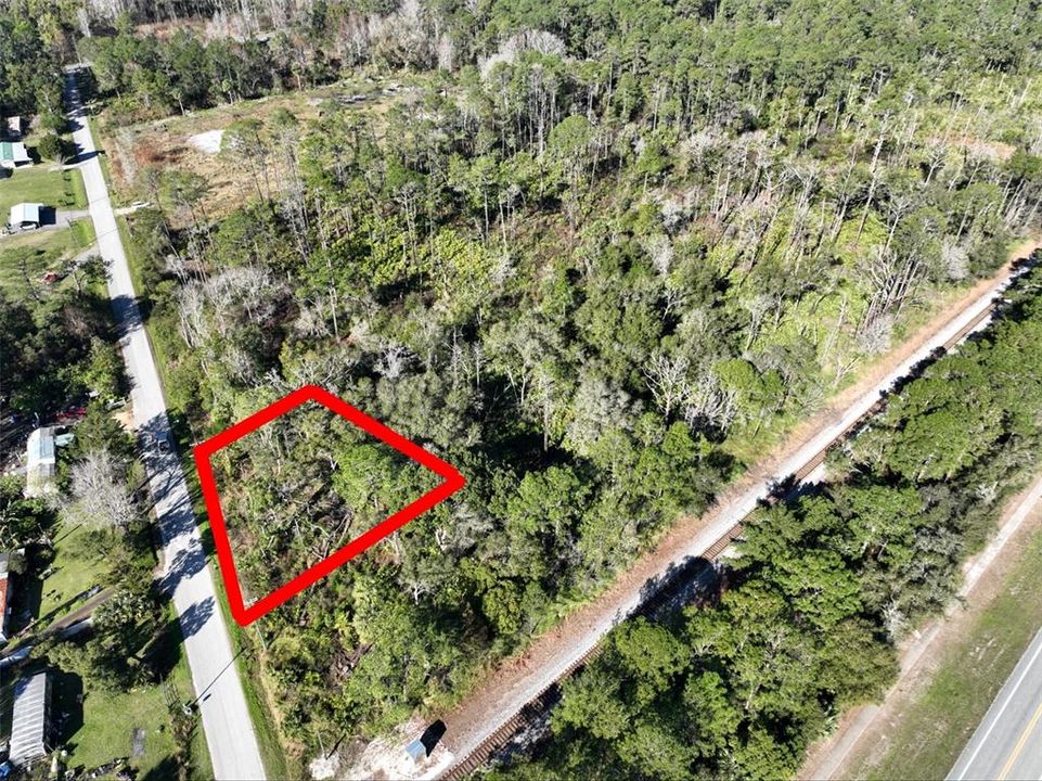 Active With Contract: $11,000 (0.21 acres)