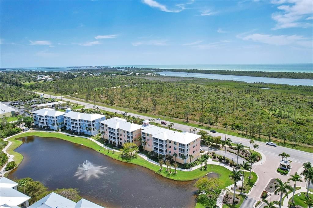 Enjoy magnificent lake views from this corner end unit located close to the Intracoastal & Gulf of Mexico