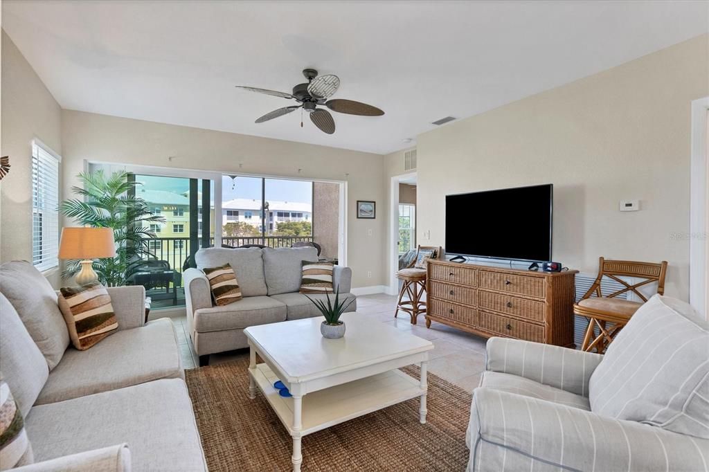 Living Room extends to lanai with spectacular lake views