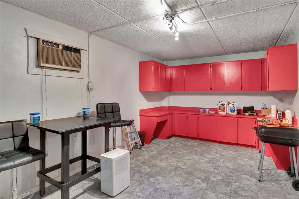 Cabinets are installed in the storage/work area and ready for you to use.