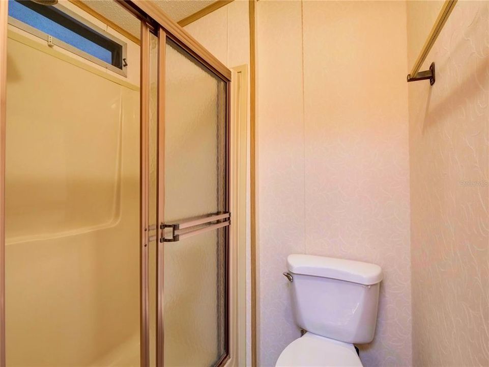 Water closet and Step in Shower