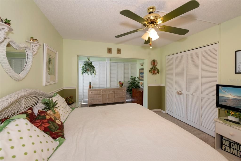 look at the size of this guest bedroom with patio access too